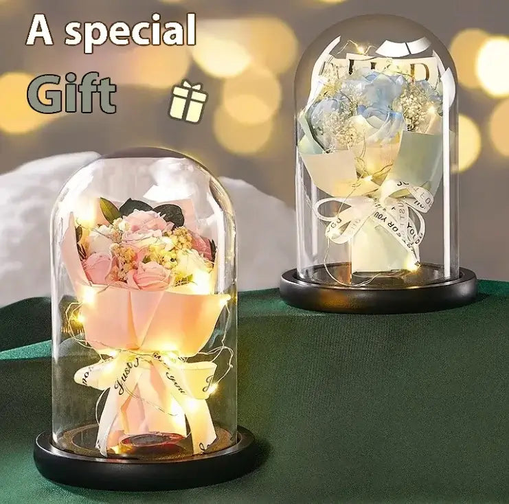 Elegant lighted floral displays in glass domes, perfect as a special gift for any occasion.