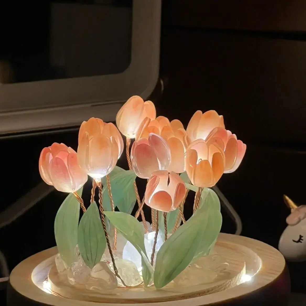 Artisanal tulip desk lamp featuring handmade glowing tulips in warm colors, perfect for home decor and gifts.