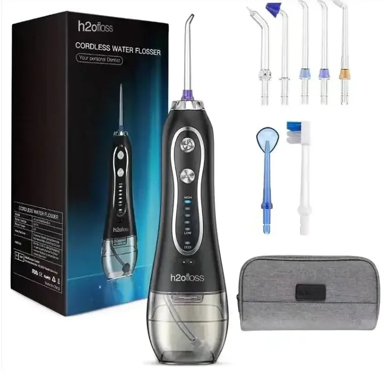 AquaFloss portable oral cleanser with multiple nozzle fittings and accessories for effective dental care on-the-go.
