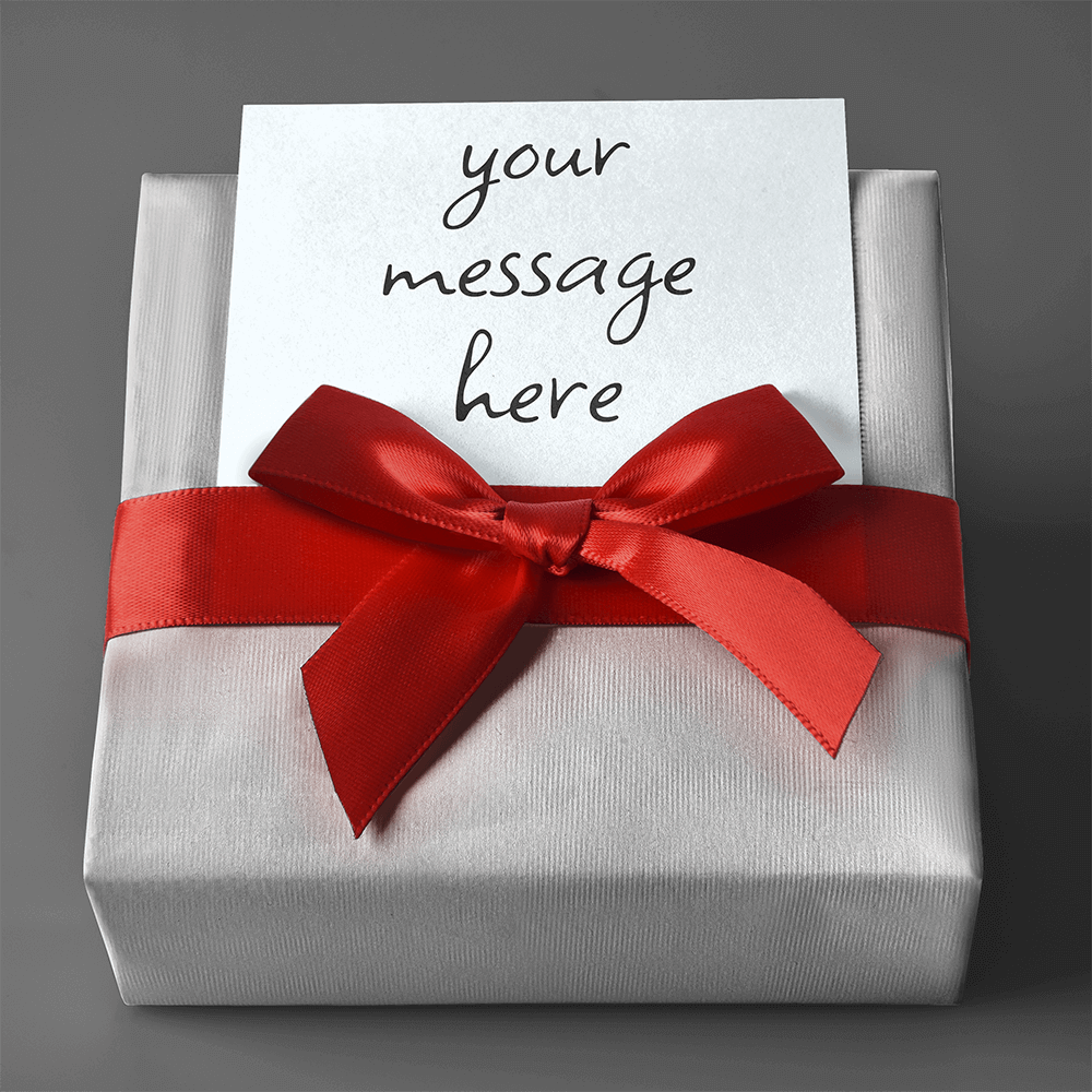 A white gift box adorned with a large red bow, featuring a blank space for a message.