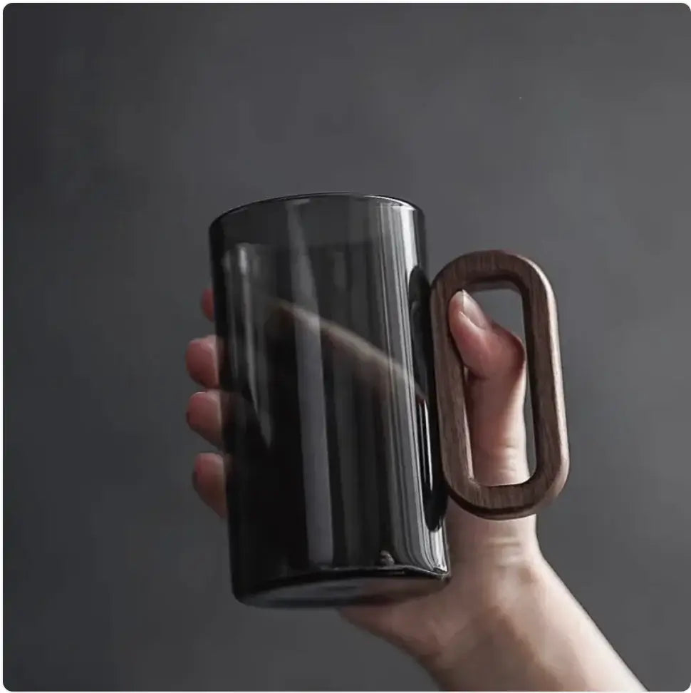 Smoky gray borosilicate beverage cup with wooden handle, perfect for stylish hydration.