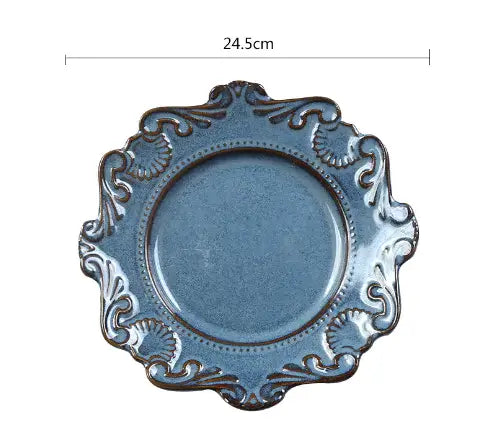 Elegant blue Baroque porcelain plate with intricate design, perfect for enhancing dining experience.