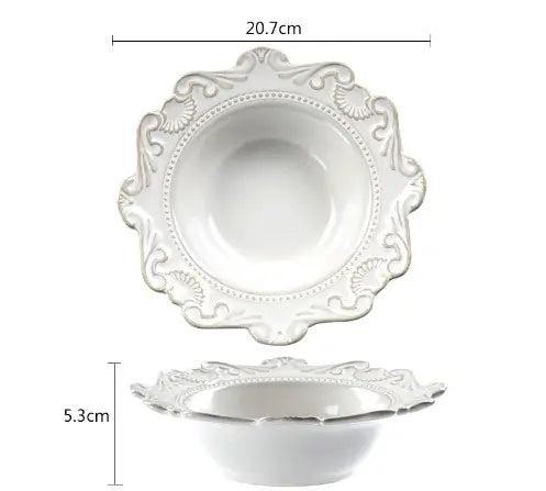 Elegant white Baroque-style porcelain bowl with intricate detailing and unique shape, ideal for sophisticated dining.