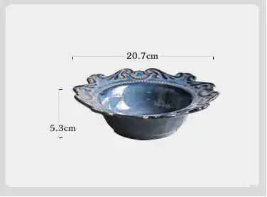 Elegant Baroque-style blue porcelain bowl with unique irregular shape, measuring 20.7cm diameter and 5.3cm depth.