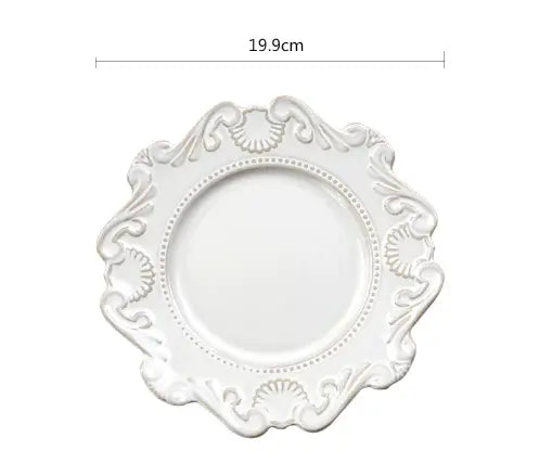 Elegant white Baroque-style plate, 19.9cm, showcasing intricate detailing and a unique shape.