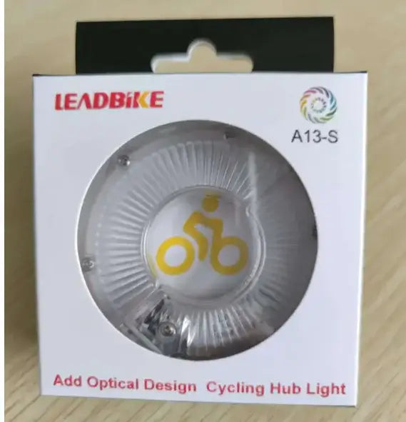 LEADBIKE A13-S cycling hub light packaging with yellow bike logo and optical design feature.