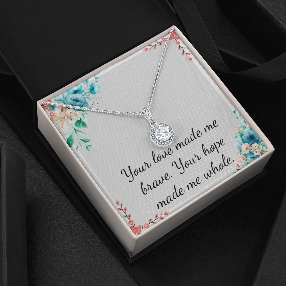 Eternal Hope Necklace in elegant gift box with heartfelt message for Mother's Day, surrounded by floral design.