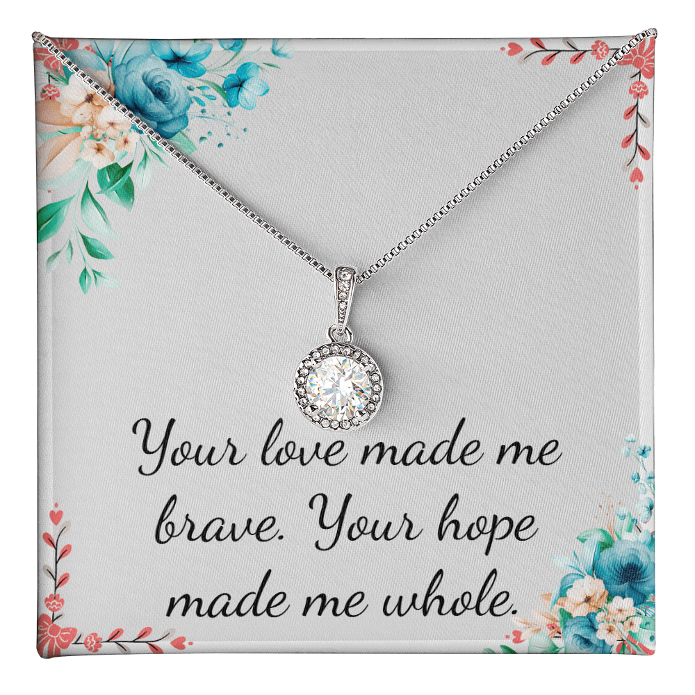 Eternal Hope Necklace on a floral background with the quote: Your love made me brave. Your hope made me whole.