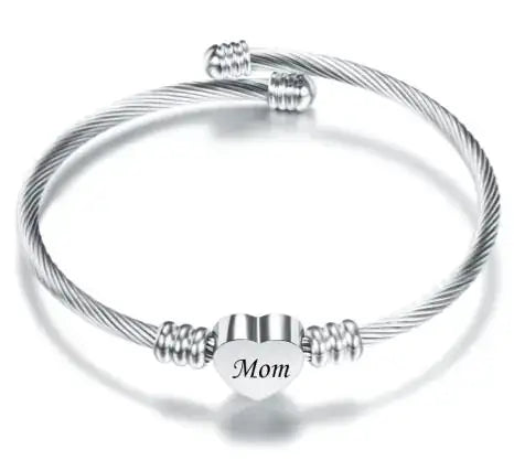 Stainless steel braided bracelet with heart charm engraved 'Mom' for Mother's Day gift.