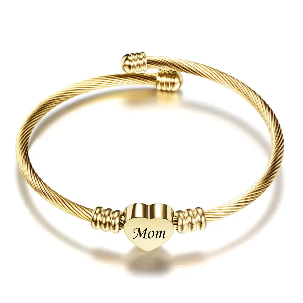 Gold stainless steel braided bracelet for Mom with heart charm, perfect Mother's Day gift.