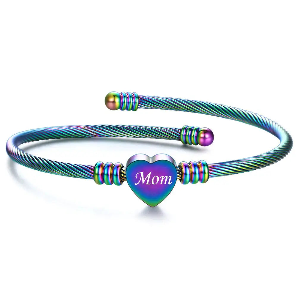 Stainless steel braided bracelet with heart charm engraved 'Mom', perfect for Mother's Day gifts.
