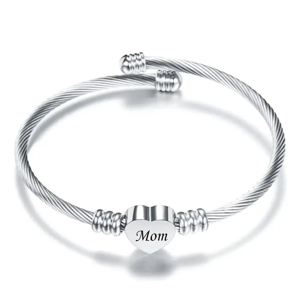 Stainless steel braided bracelet with heart charm engraved 'Mom', perfect for Mother's Day gift.