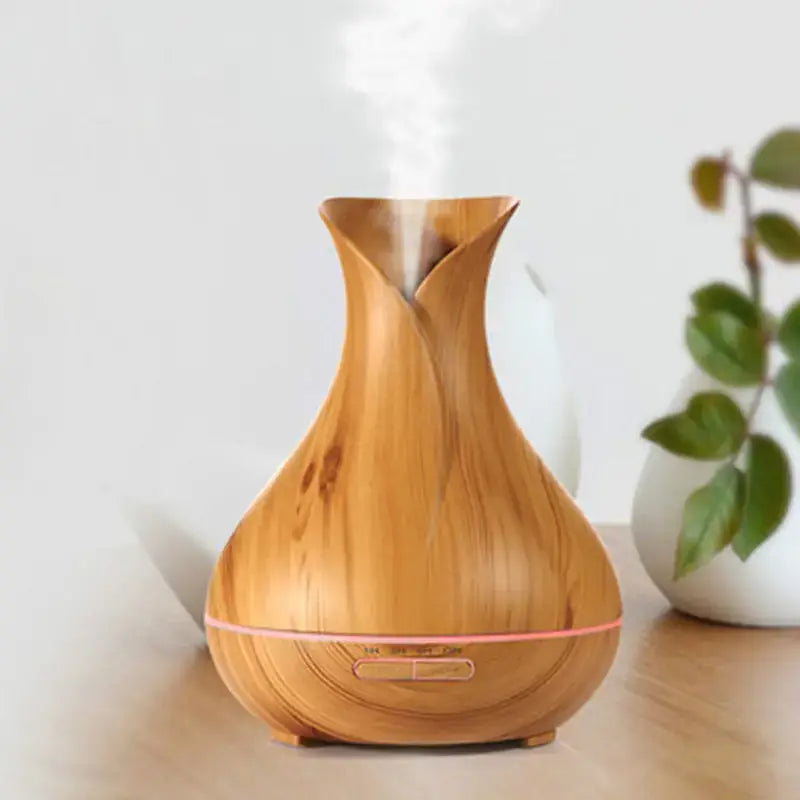 Wood grain aromatherapy diffuser with vapor, enhancing home ambiance and interior decor.