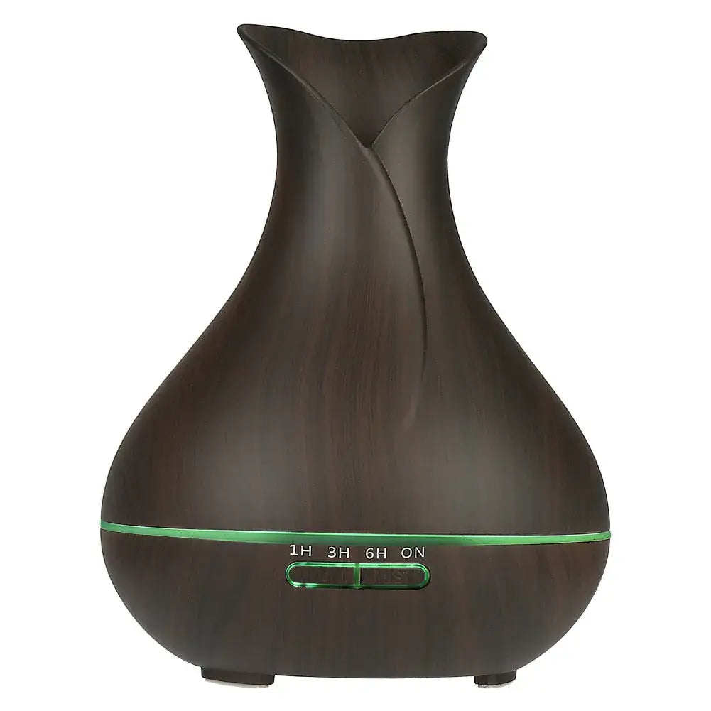 Wood grain aromatherapy diffuser and humidifier, vase-shaped design for home ambiance and decor.