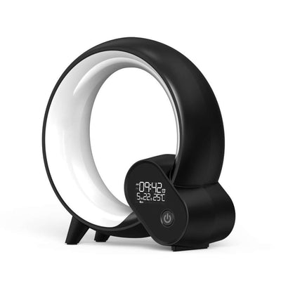 Creative Q Light Analog Sunrise Digital Display Alarm Clock in sleek black design with intuitive interface.