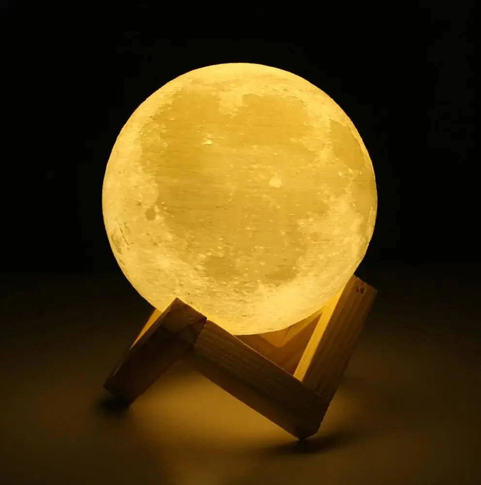 3D Touch Control Moon Lamp glowing softly on wooden stand, perfect for home decor and soothing night light.