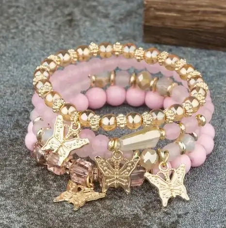 Butterfly Bliss Beaded Bracelets set with butterfly charms and colorful beads, perfect for elegant accessories.