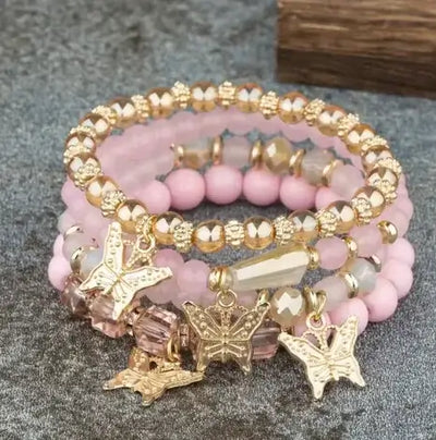 Butterfly Bliss Beaded Bracelets set with butterfly charms and colorful beads, perfect for elegant accessories.