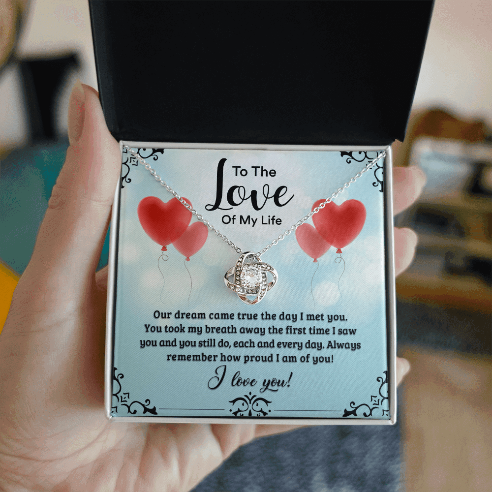 A heartfelt letter expressing love, featuring phrases like "To The Love Of My Life," and "I love you!" Decorated with a heart design, suitable for Valentine's Day.