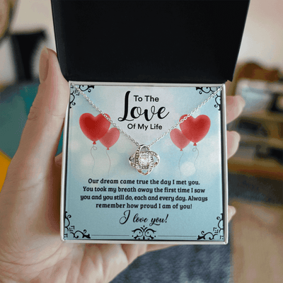 A heartfelt letter expressing love, featuring phrases like "To The Love Of My Life," and "I love you!" Decorated with a heart design, suitable for Valentine's Day.
