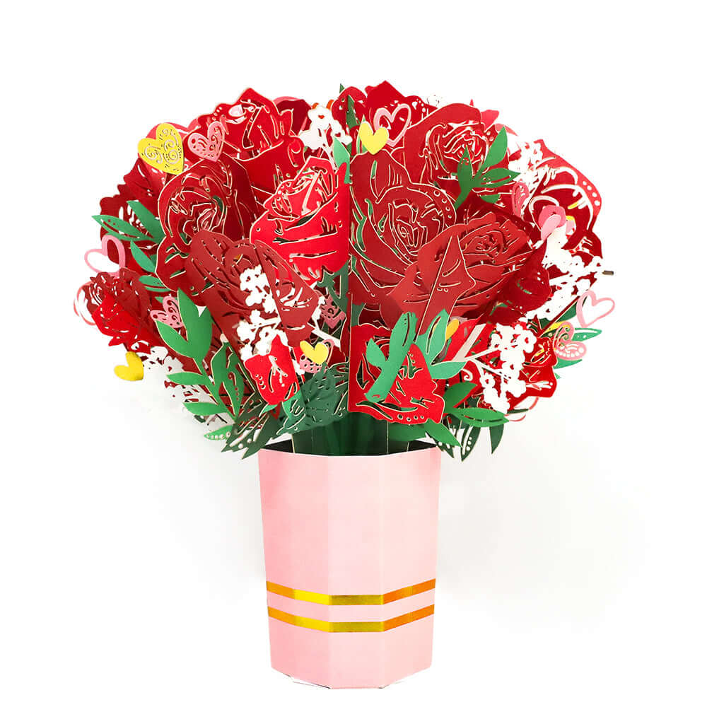 A vase filled with vibrant red flowers arranged elegantly.