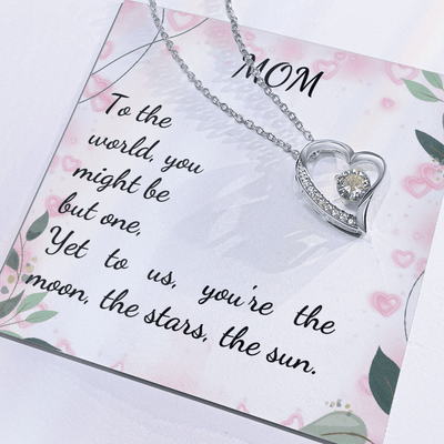 Forever Love Necklace for Mom with heart pendant and CZ crystal, featuring sentimental quote about love.