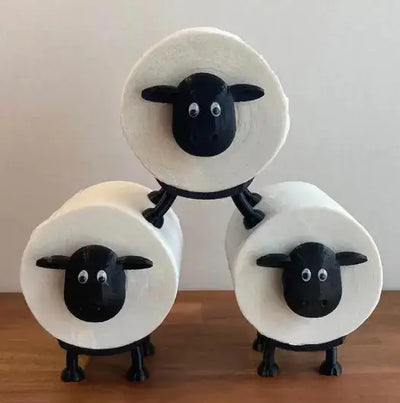 Cute sheep toilet paper roll holder with playful sheep design, perfect for quirky bathroom décor.