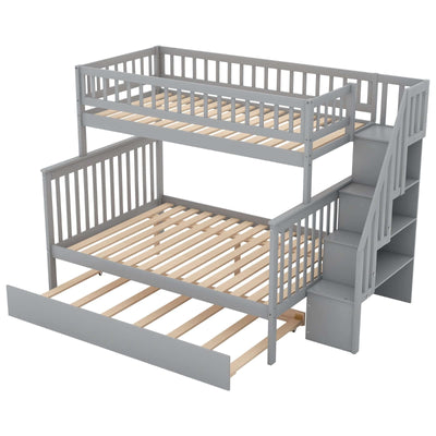 Gray twin over full bunk bed with trundle and staircase, perfect space-saving solution for kids' bedrooms.