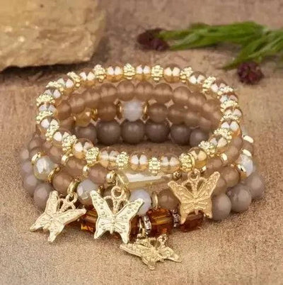 Butterfly Bliss Beaded Bracelets set with vibrant beads and butterfly charms, perfect accessory for any outfit.