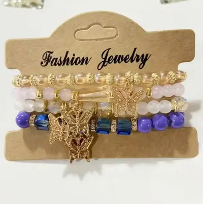 Butterfly Bliss Beaded Bracelets set with vibrant beads and butterfly motifs on a jewelry card.