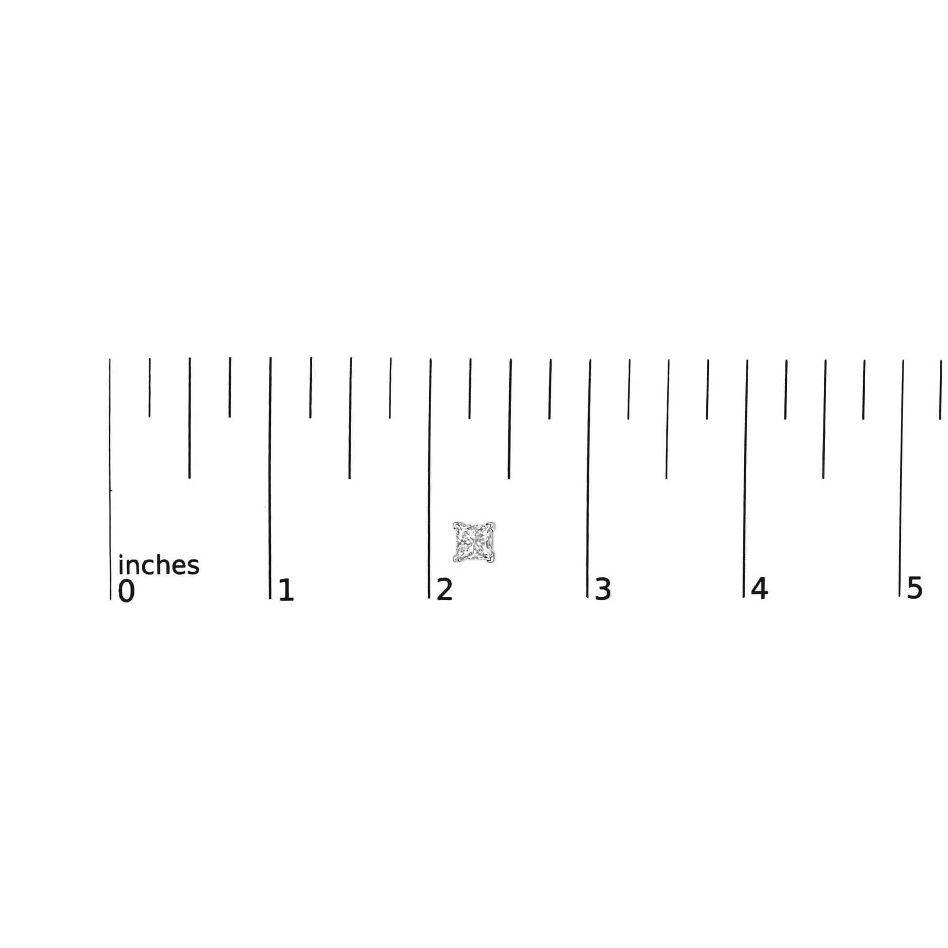 Ruler showing 2 inches with a small princess cut diamond to indicate size reference.
