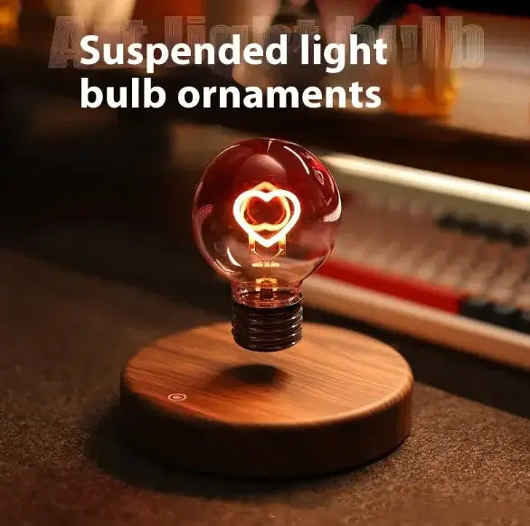 Magnetic suspension bulb lamp with heart design, creating a warm ambiance for night or decorative use.