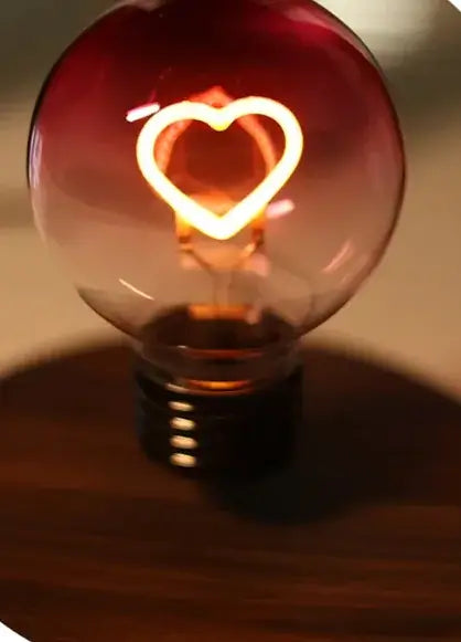 Magnetic Suspension Bulb Love Night Lamp with heart-shaped filament glow, creating a charming ambiance.
