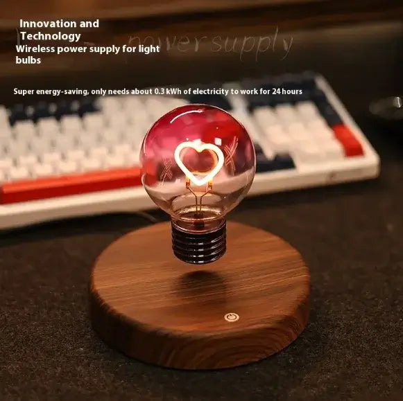 Magnetic suspension night lamp with heart-shaped bulb design on wooden base, perfect for a romantic ambiance.
