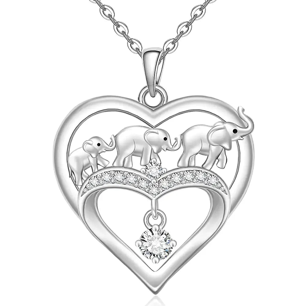 925 Sterling Silver elephant necklace with heart-shaped pendant and sparkling birthstone accent.