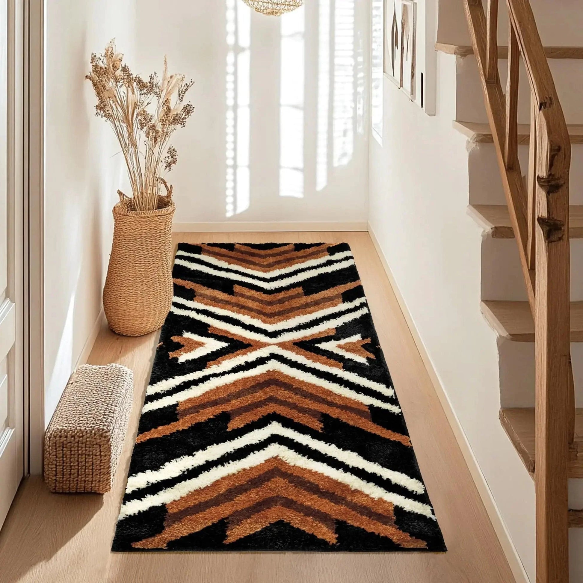 Tyrot Black Aztec Boho Rug Runner in stylish entryway, showcasing a plush design and vibrant geometric patterns.