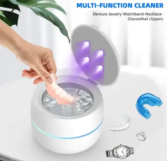 Ultrasonic UV cleaner sanitizing jewelry and dental items, featuring a user-friendly design with water and UV light.